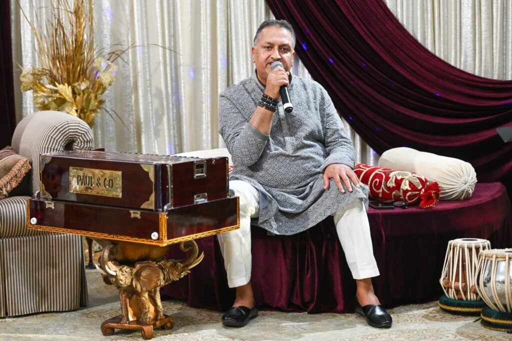 Rang-e-Mohabbat male artist seated on stage setup