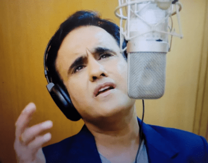 Male vocalist expressing emotion during song – Rang-E-Mohabbat