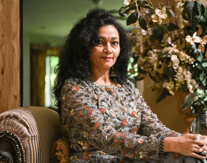 Rang-e-Mohabbat female performer posing at music event